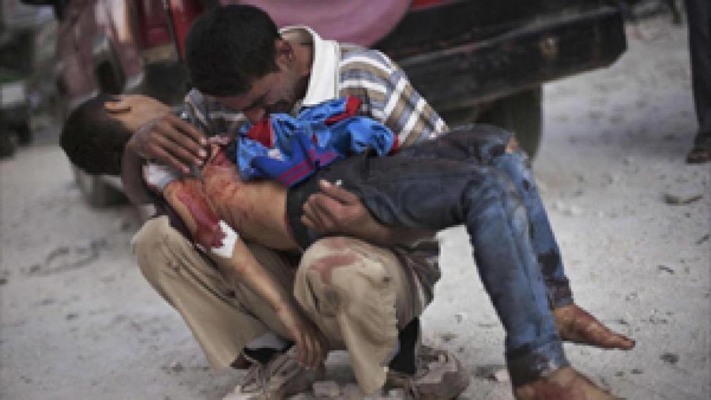 Image: El fotógrafo español Manu Brabo gana un Premio Pulitzer 2013