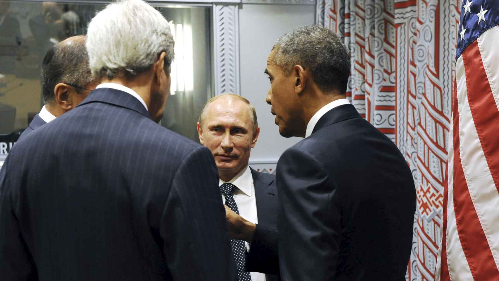 El ministro de Exteriores ruso, Sergei Lavrov, el secretario de Estado de EEUU John Kerry y los  presidentes Barack Obama y Vladímir Putin durante su reunión del lunes en el marco de la Asamblea General de la ONU.