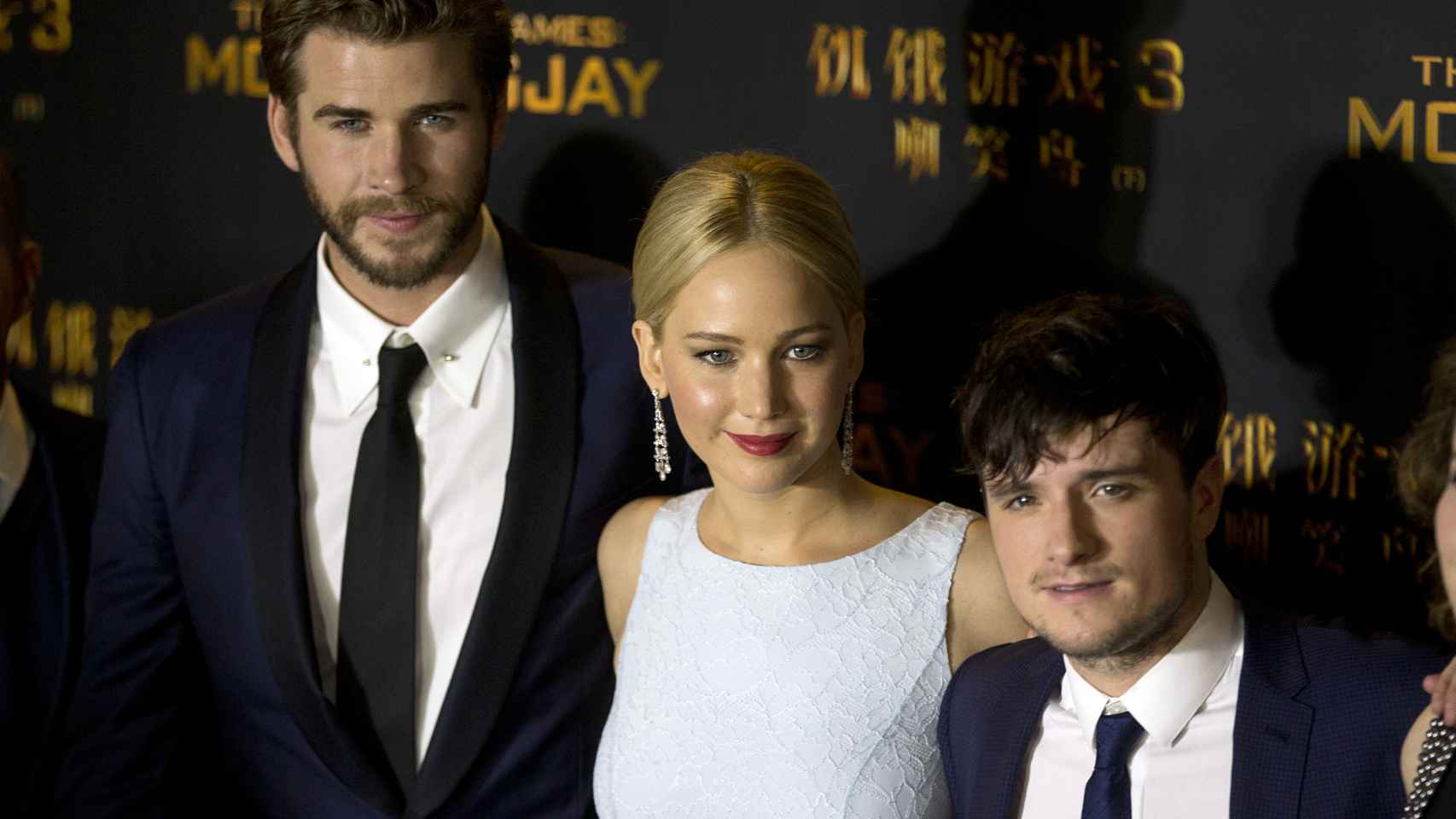 Liam Hemsworth, Jennifer Lawrence y Josh Hutchersony en la presentación en China