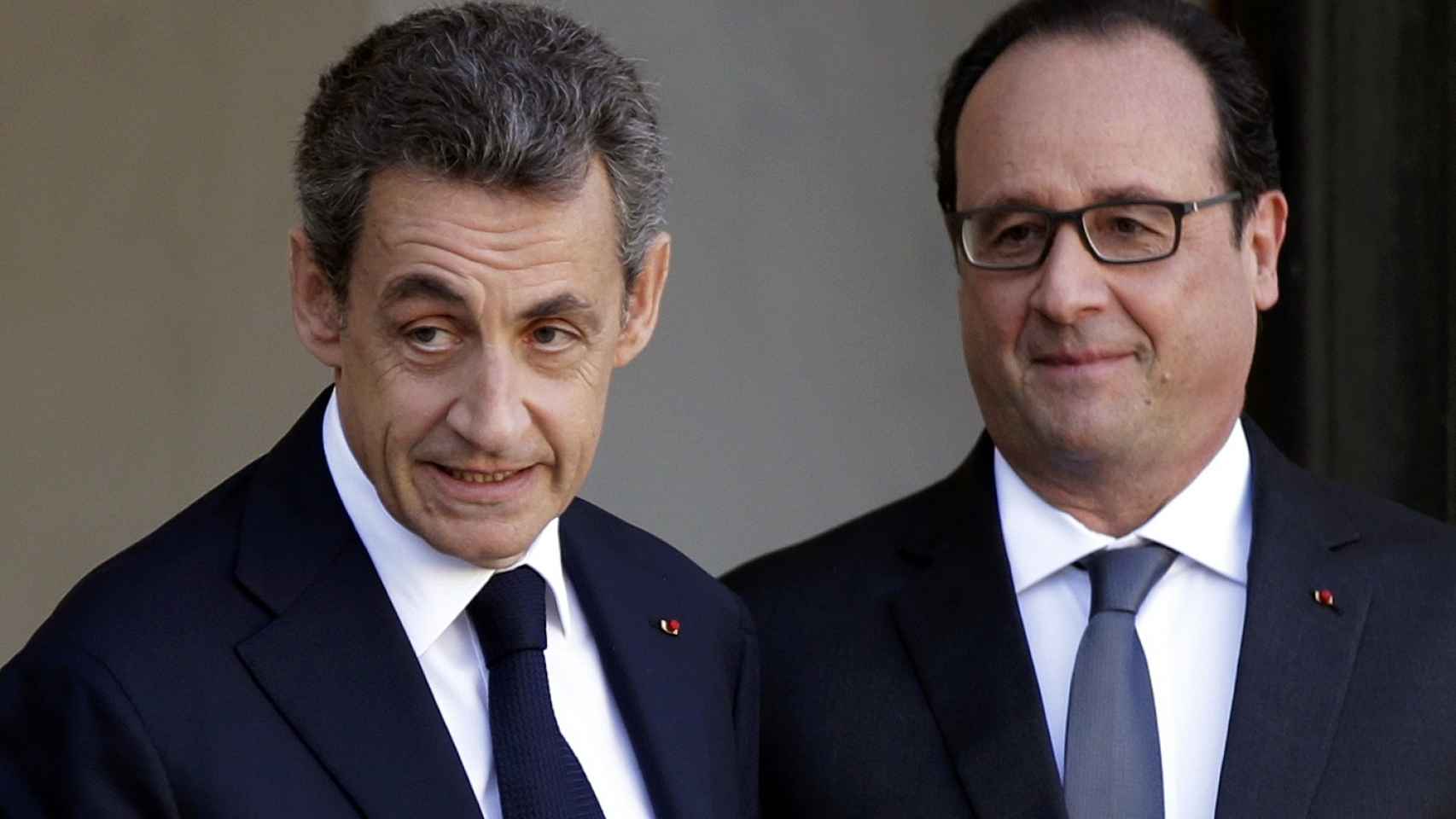 El líder republicano, Nicolas Sarkozy, junto al presidente François Hollande.