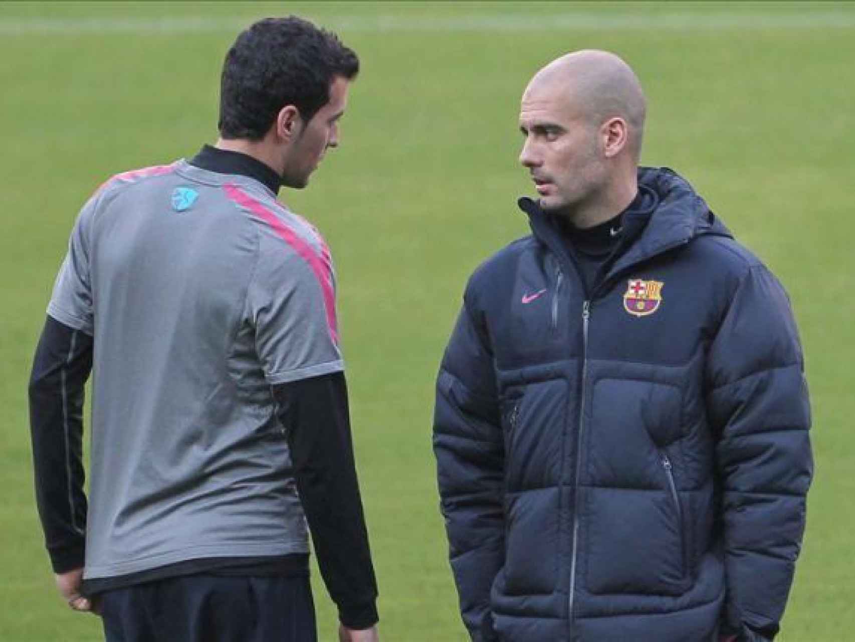 Busquets y Guardiola, durante su etapa en común en Can Barça.