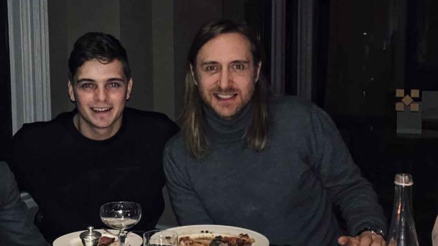 DJ Guetta cenando con Garrix