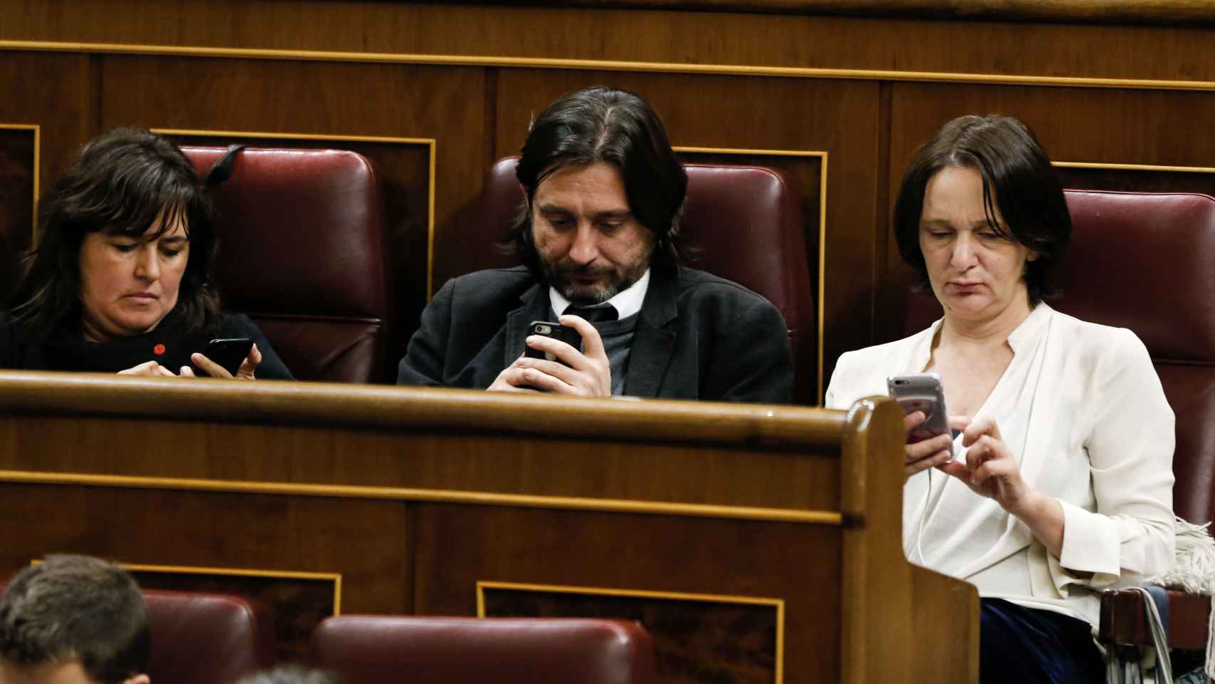 Los diputados de Podemos durante el debate de investidura
