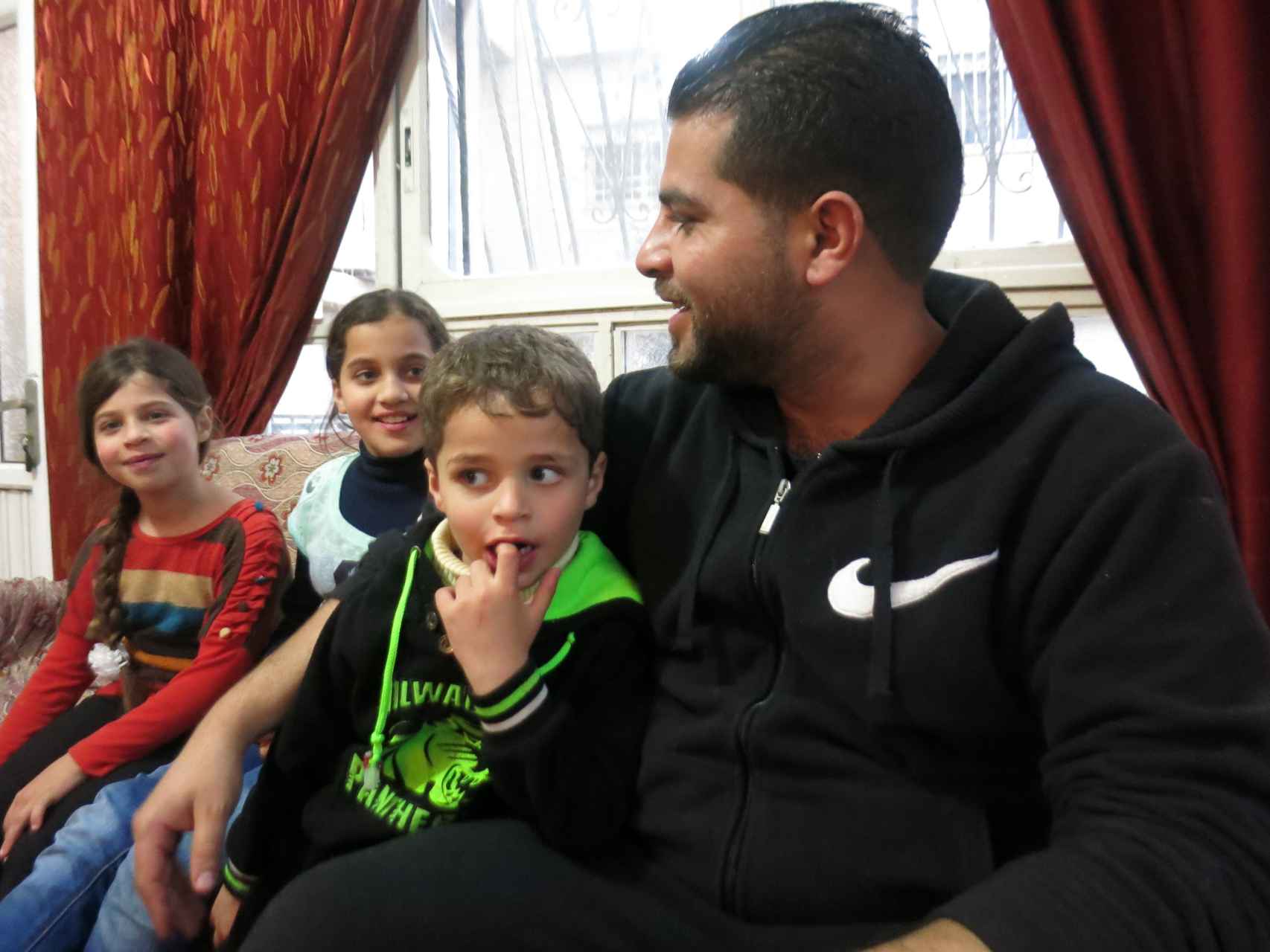 Alaa al-Din Mohammed Ali y sus tres hijos.