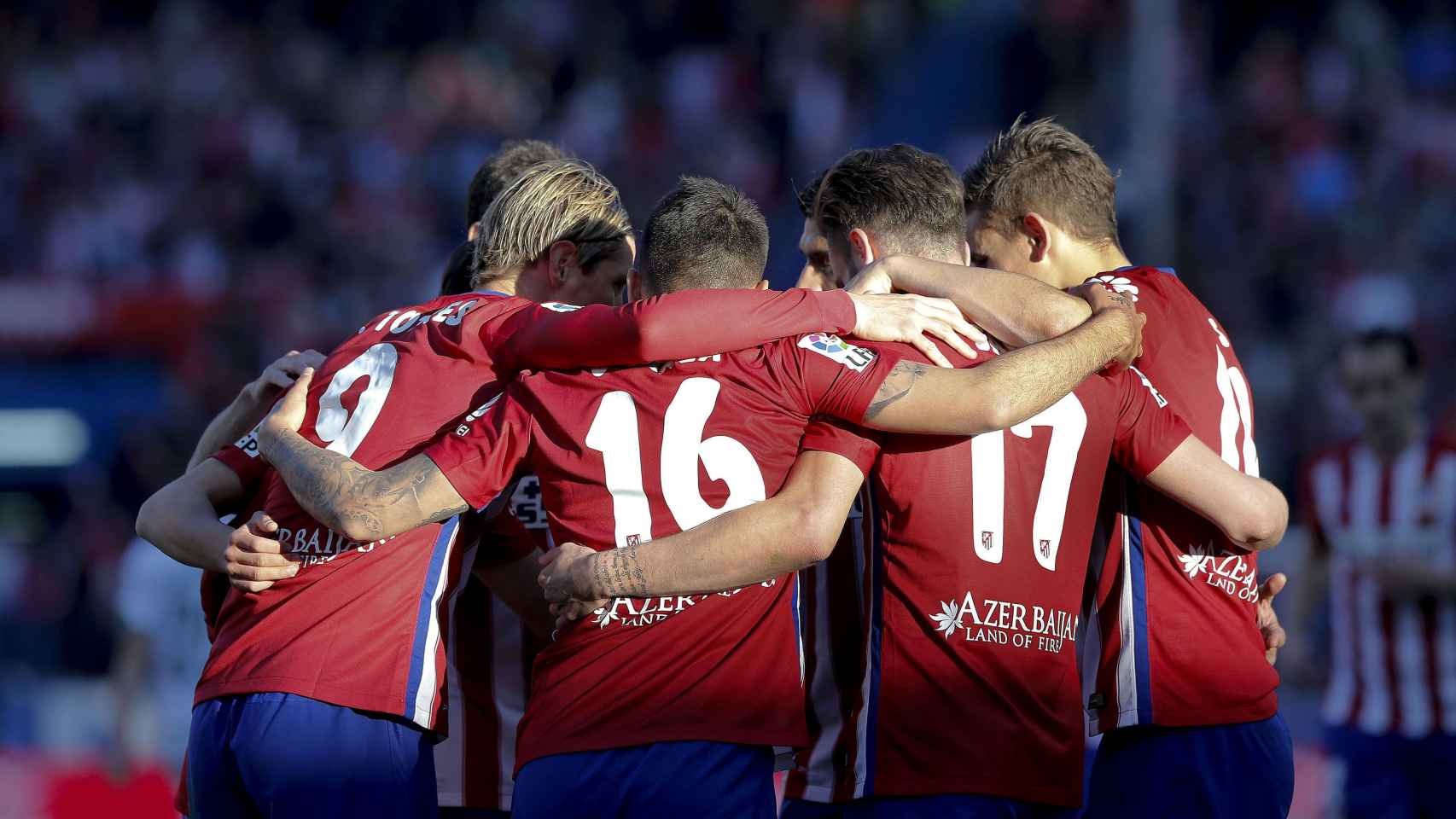 Los jugadores del Atlético celebran el gol de Correa ante el Granada.