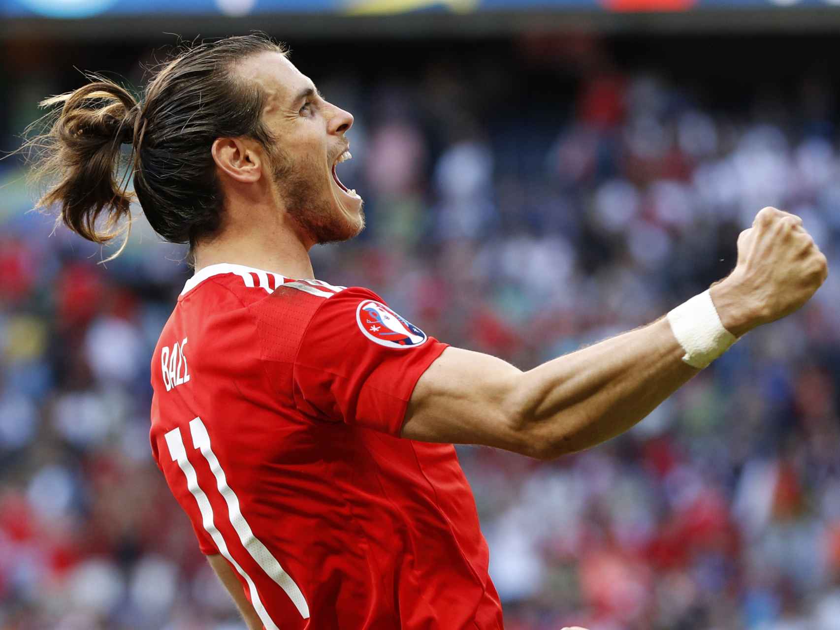 Gareth Bale celebra la victoria de su selección.