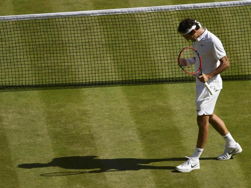 Federer celebra un punto en Wimbledon.