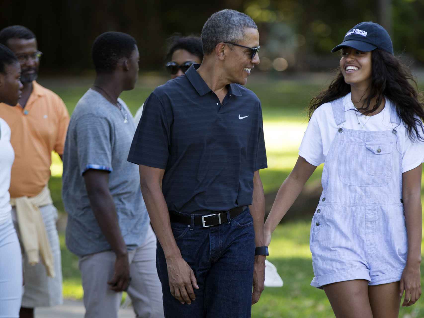 Malia Obama junto a su padre