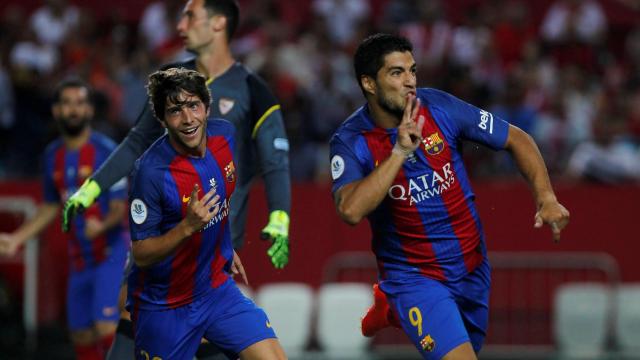 Luis Suárez celebra su gol ante el Sevilla.