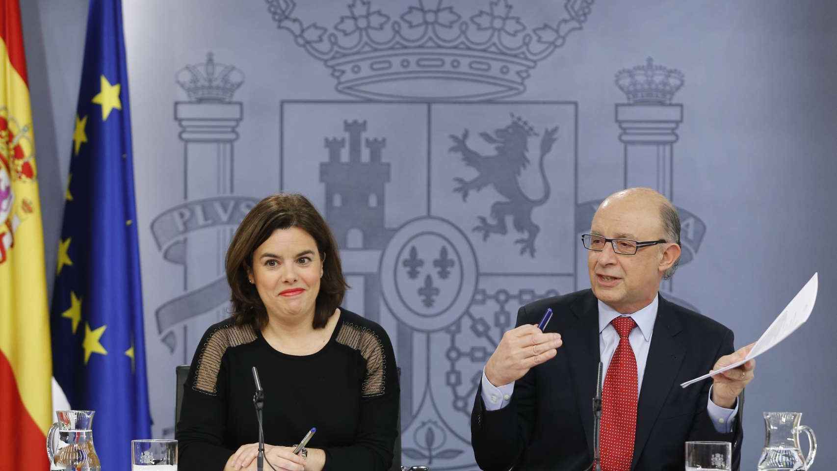 Cristóbal Montoro y Soraya Sáenz de Santamaría
