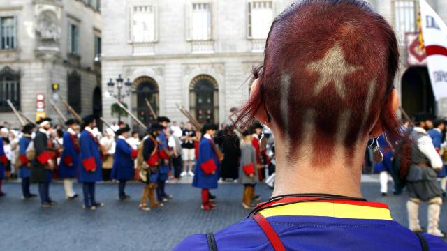 Una militante independentista en uno de los actos de la Diada.