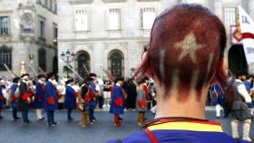 Una militante independentista en uno de los actos de la Diada.