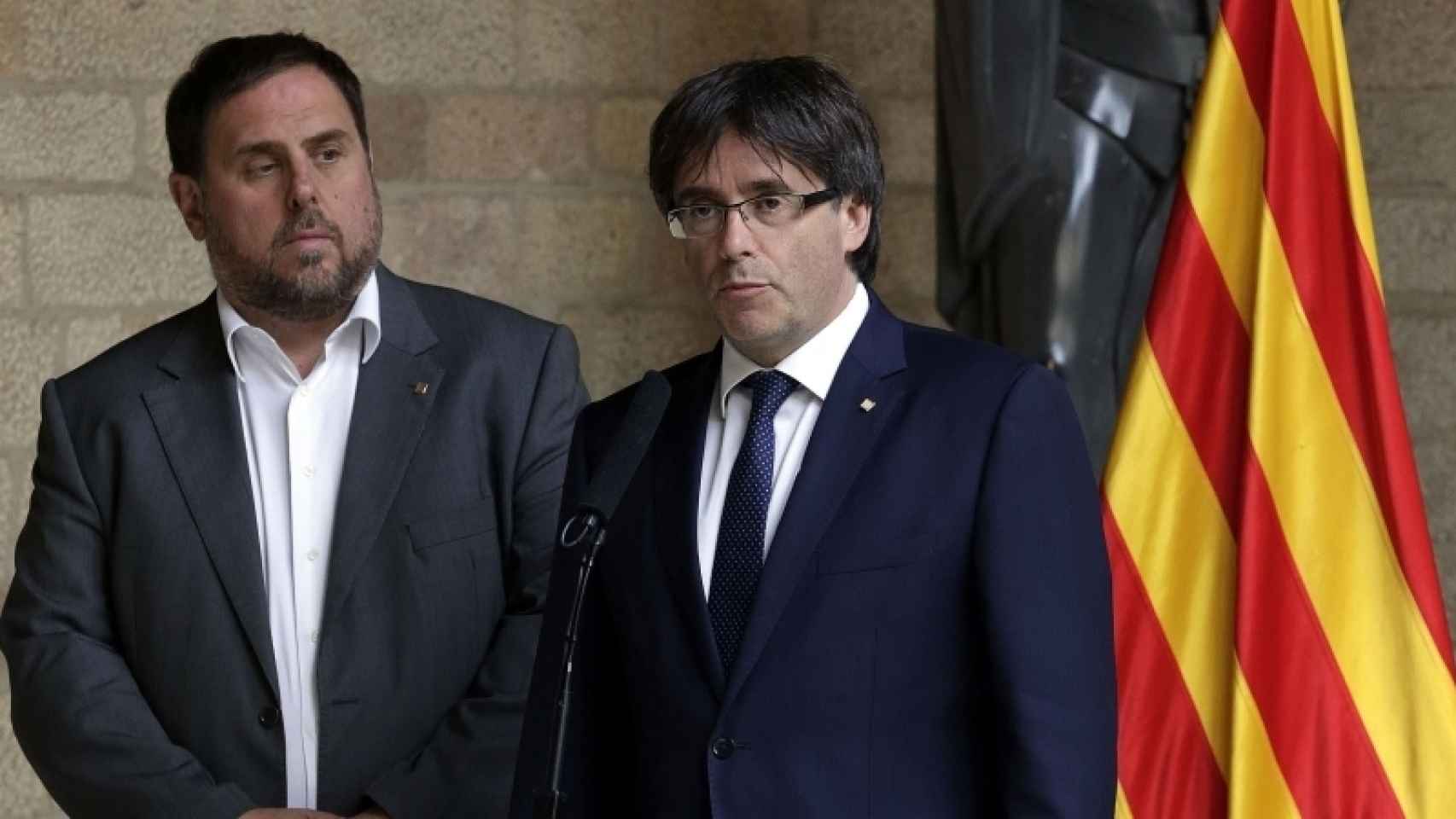 Junqueras y Puigdemont, en un acto sobre el referéndum.