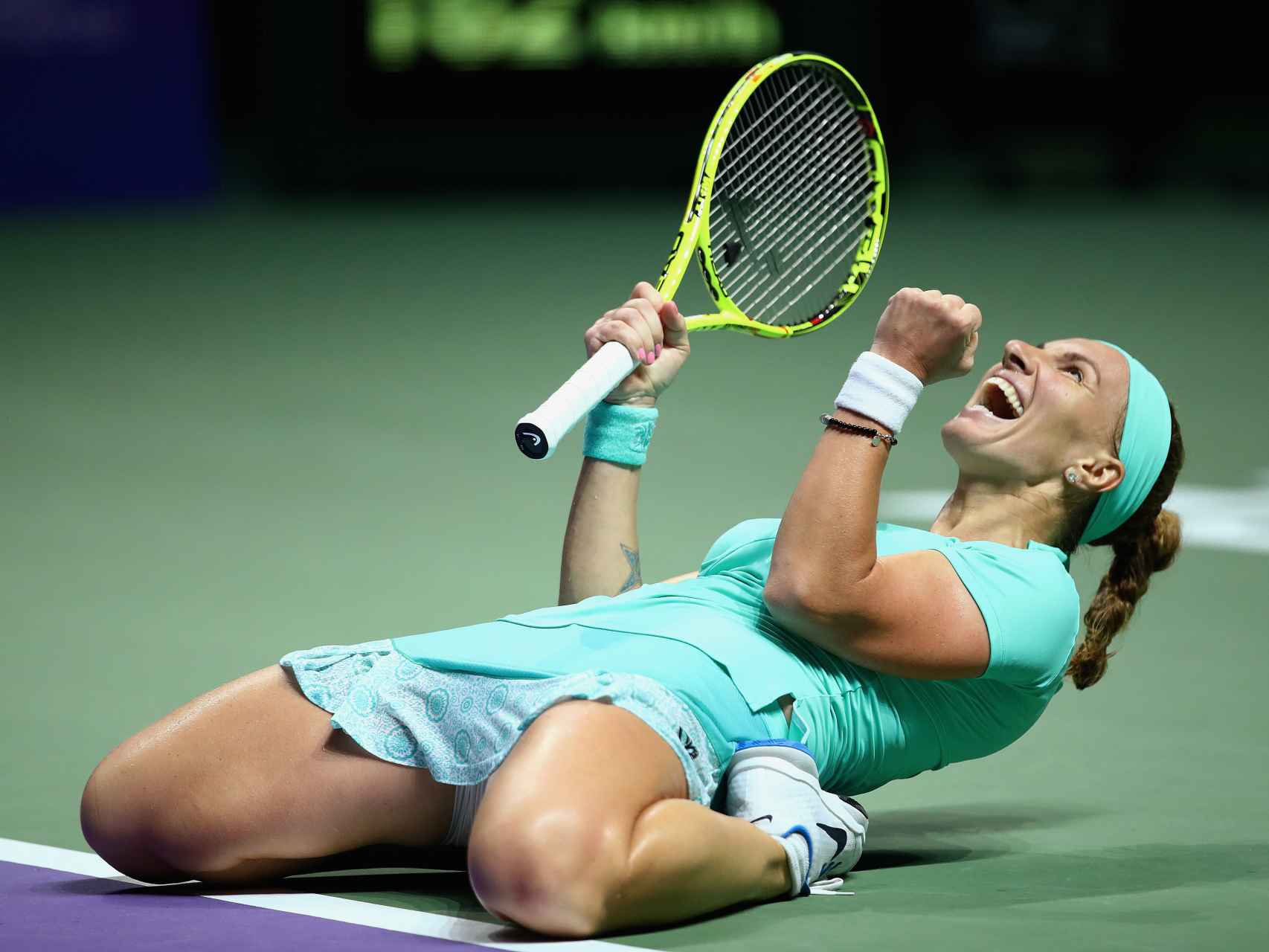 Kuznetsova celebra su victoria contra Karolina Pliskova en Singapur.