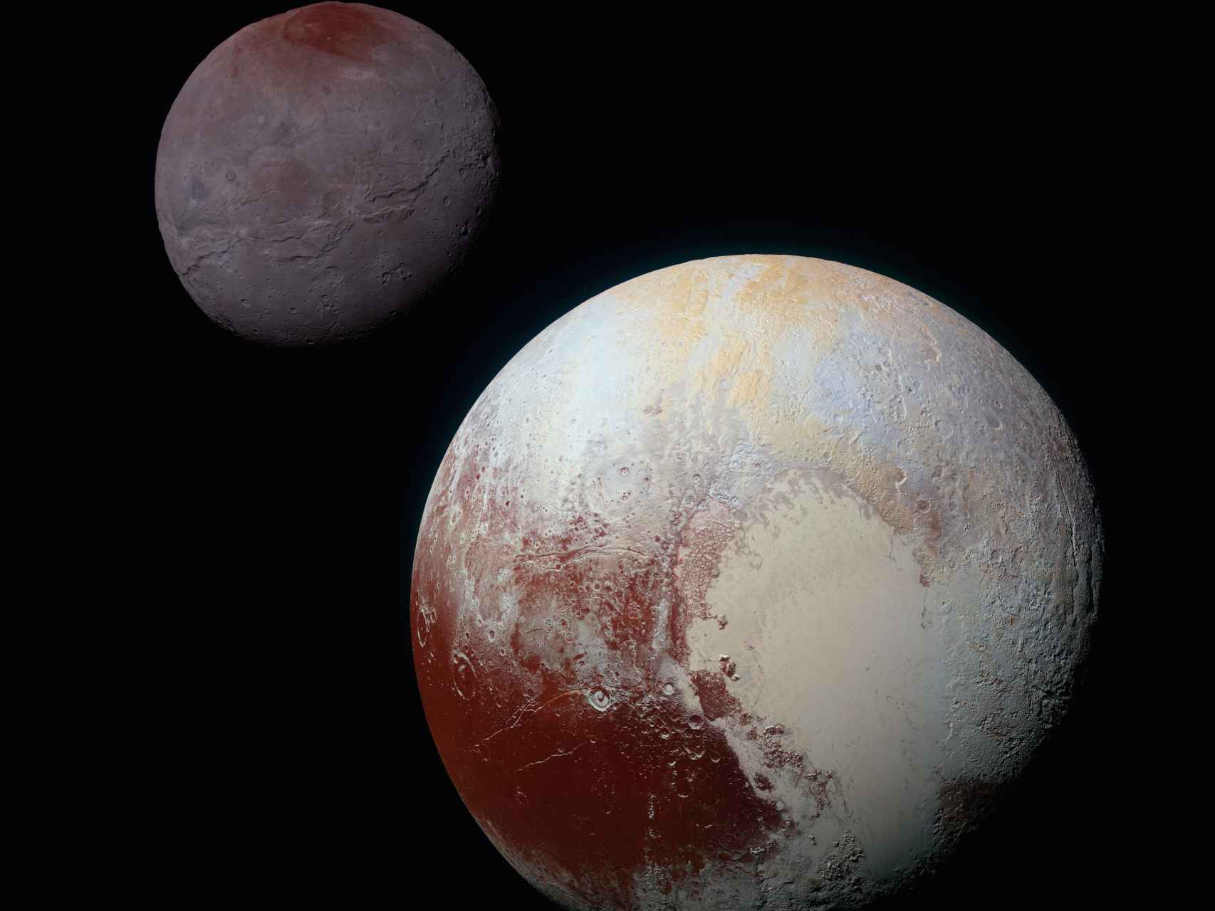 Plutón y una de sus lunas