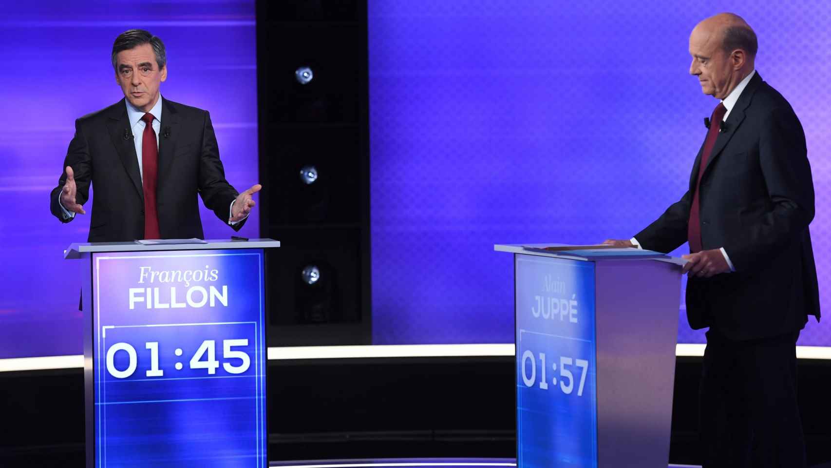 Fillon y Juppé, durante el debate por las primarias.