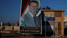 Un cartel de Asad en un área de Alepo controlada por el Gobierno sirio