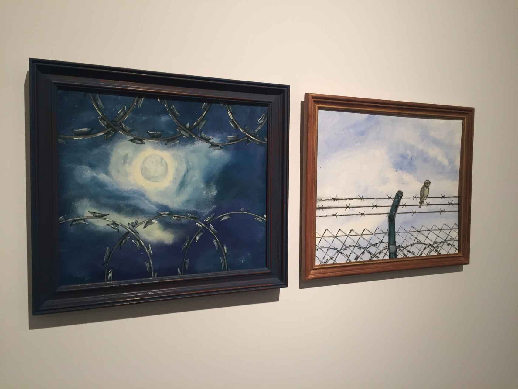 Dos pinturas de los reclusos incluidas en la exposición de Barcelona.