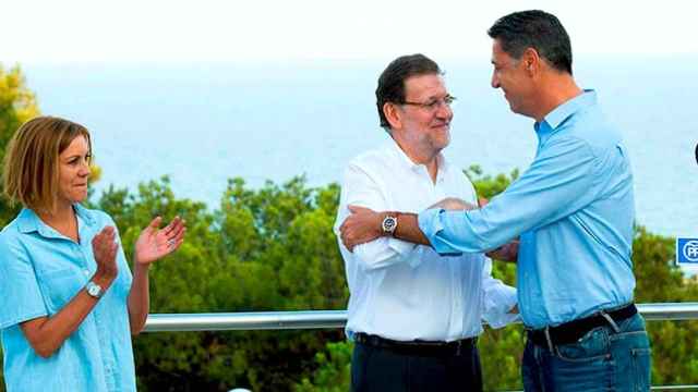 Rajoy presentando al candidato del PPC a las elecciones catalanas, Xavier Garcia Albiol, el verano pasado.