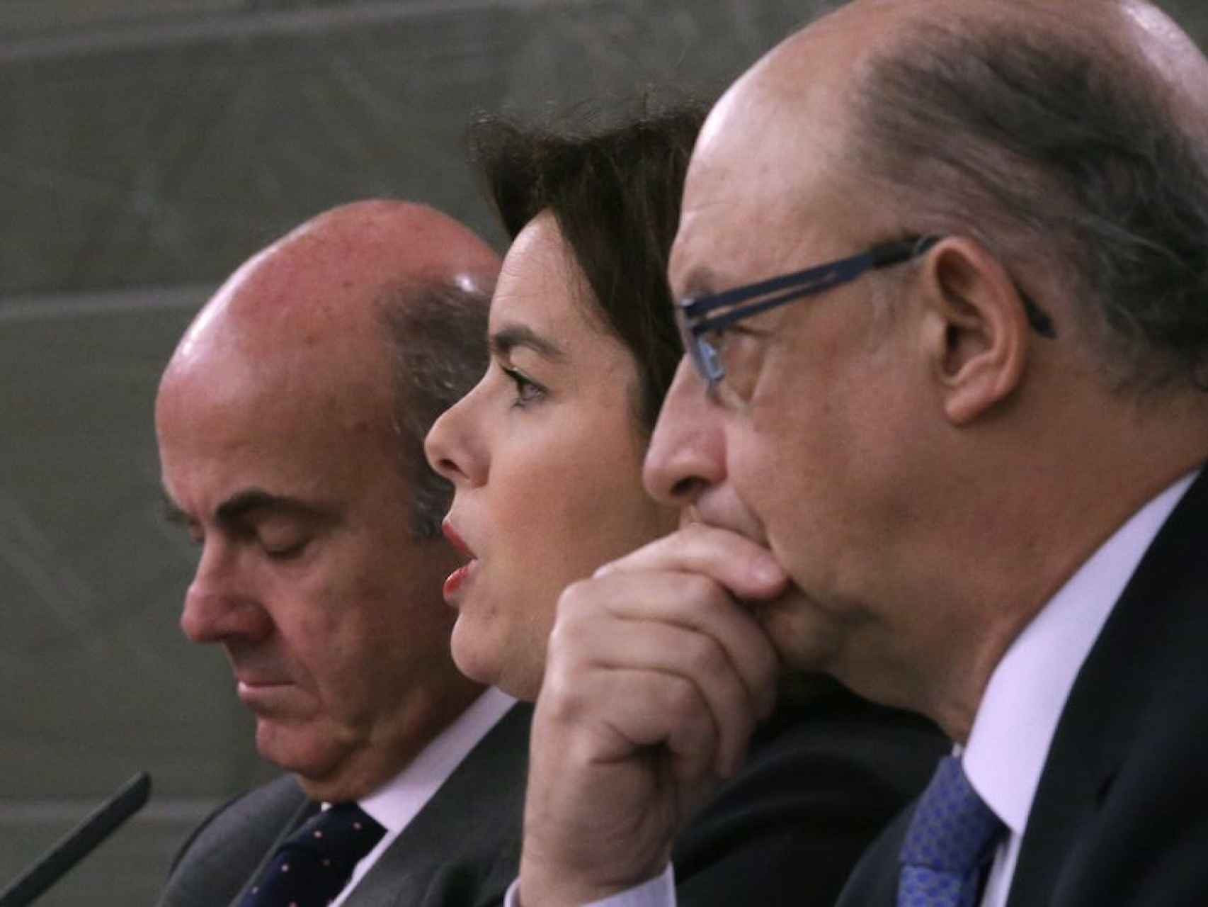 Luis de Guindos, Soraya Sáez y Cristobal Montoro.