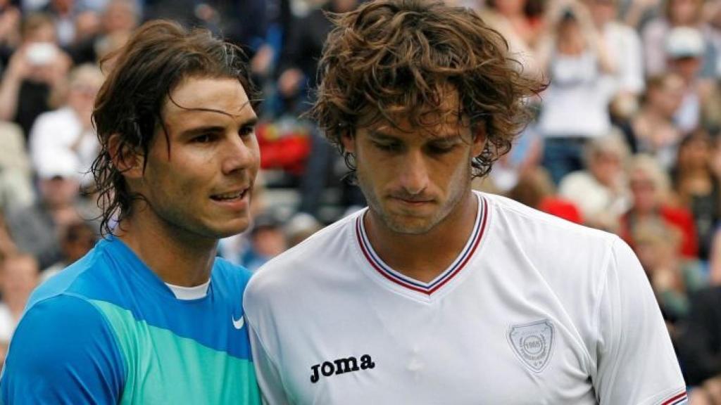 Rafael Nadal y Felicano López tras su encuentro en Queen's en 2010.