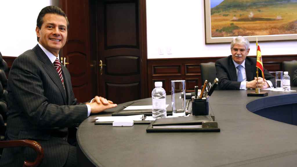 El presidente mexicano en la reunión con Dastis.