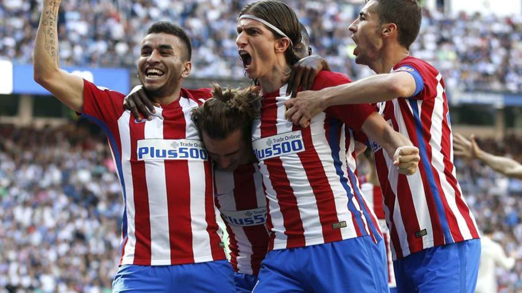 Griezmann celebra su gol frente al Madrid con Correa, Gabi y Filipe.