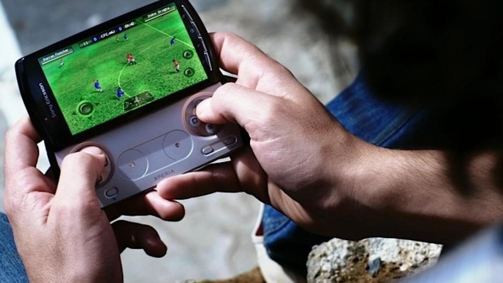 A person playing with Sony Xperia Play