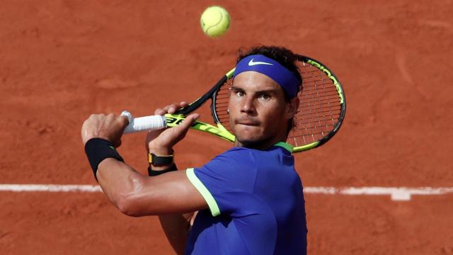 Nadal, voleando en el partido contra Haase.