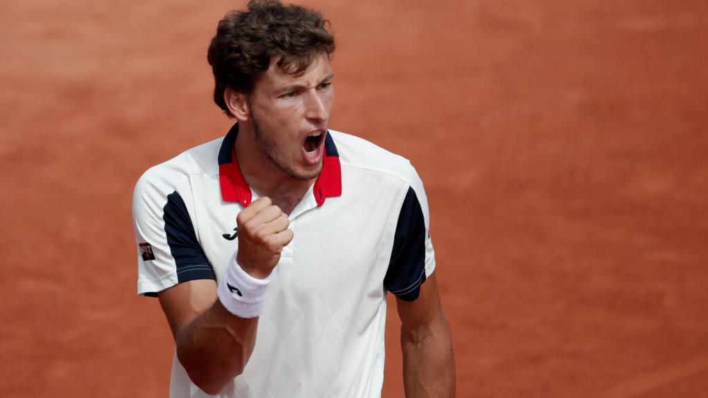 Carreño, celebrando un punto ante Raonic.