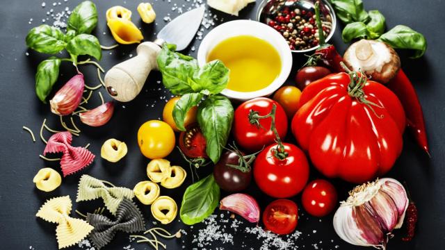 Italian ingredients - pasta, vegetables, spices, cheese