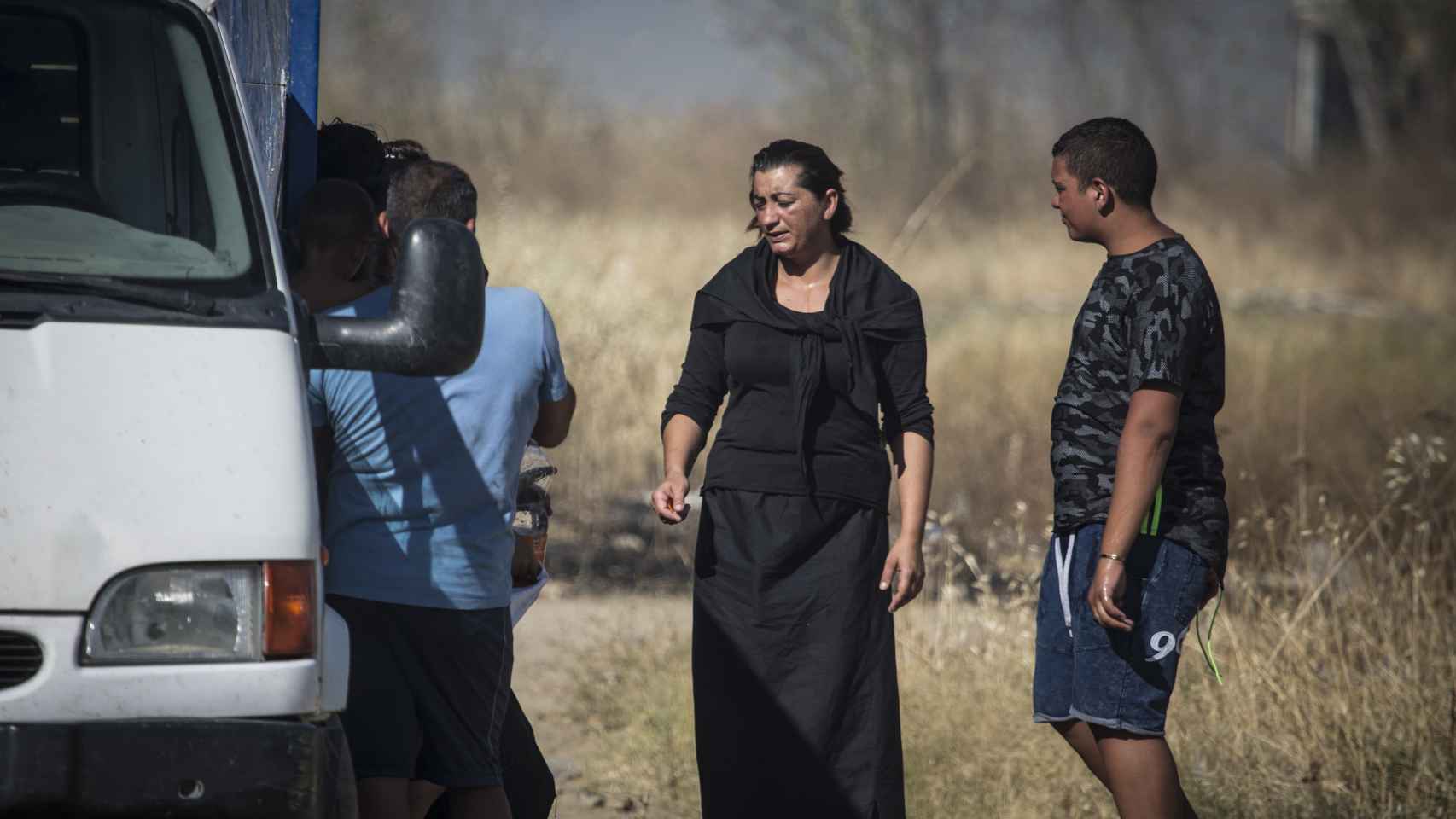 Sole y su familia tras haberlo perdido todo en el incendio. Foto: Fernando Ruso