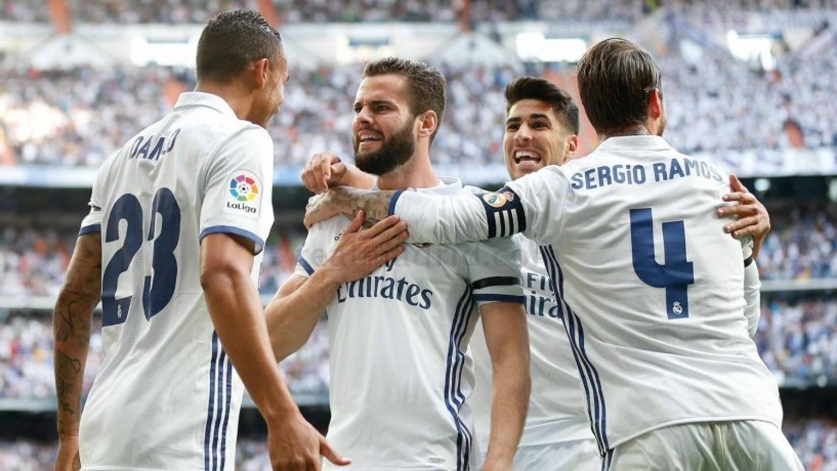 Nacho celebra con Danilo, Asensio y Ramos