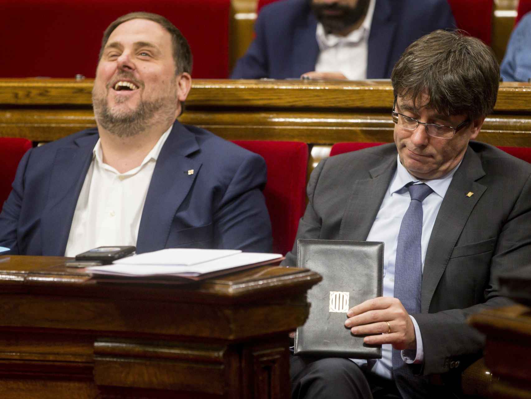 Carles Puigdemont  junto al vicepresidente Oriol Junqueras.
