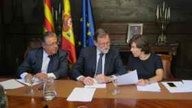 Zoido, Rajoy y Sáenz de Santamaría, de izquierda a derecha