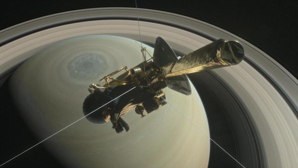 The spacecraft Cassini is pictured above Saturn's northern hemisphere prior to making one of its Grand Finale dives in this NASA handout illustration