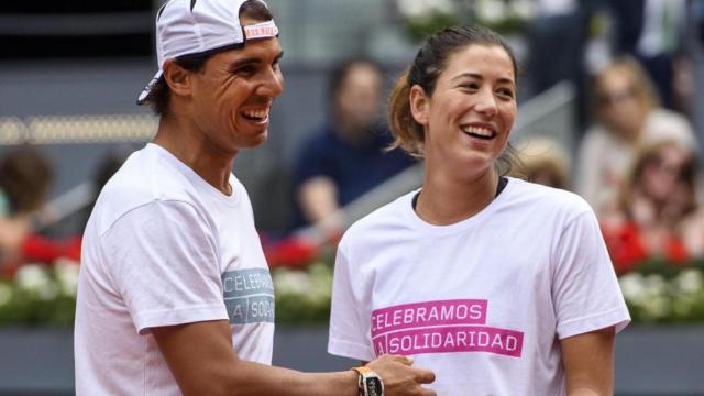 Nadal y Muguruza, durante el Charity Day del Mutua Madrid Open en 2016.