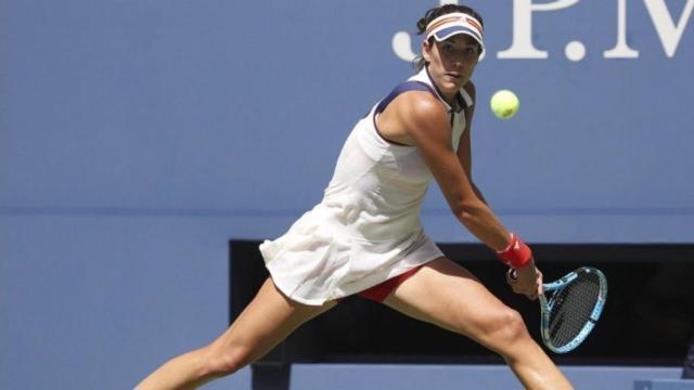 Garbiñe Muguruza durante un partido en el US Open. Foto: Twitter (@GarbiMuguruza).