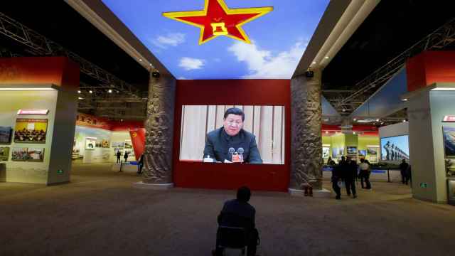 Imagen del presidente chino en una exposición en Pekín