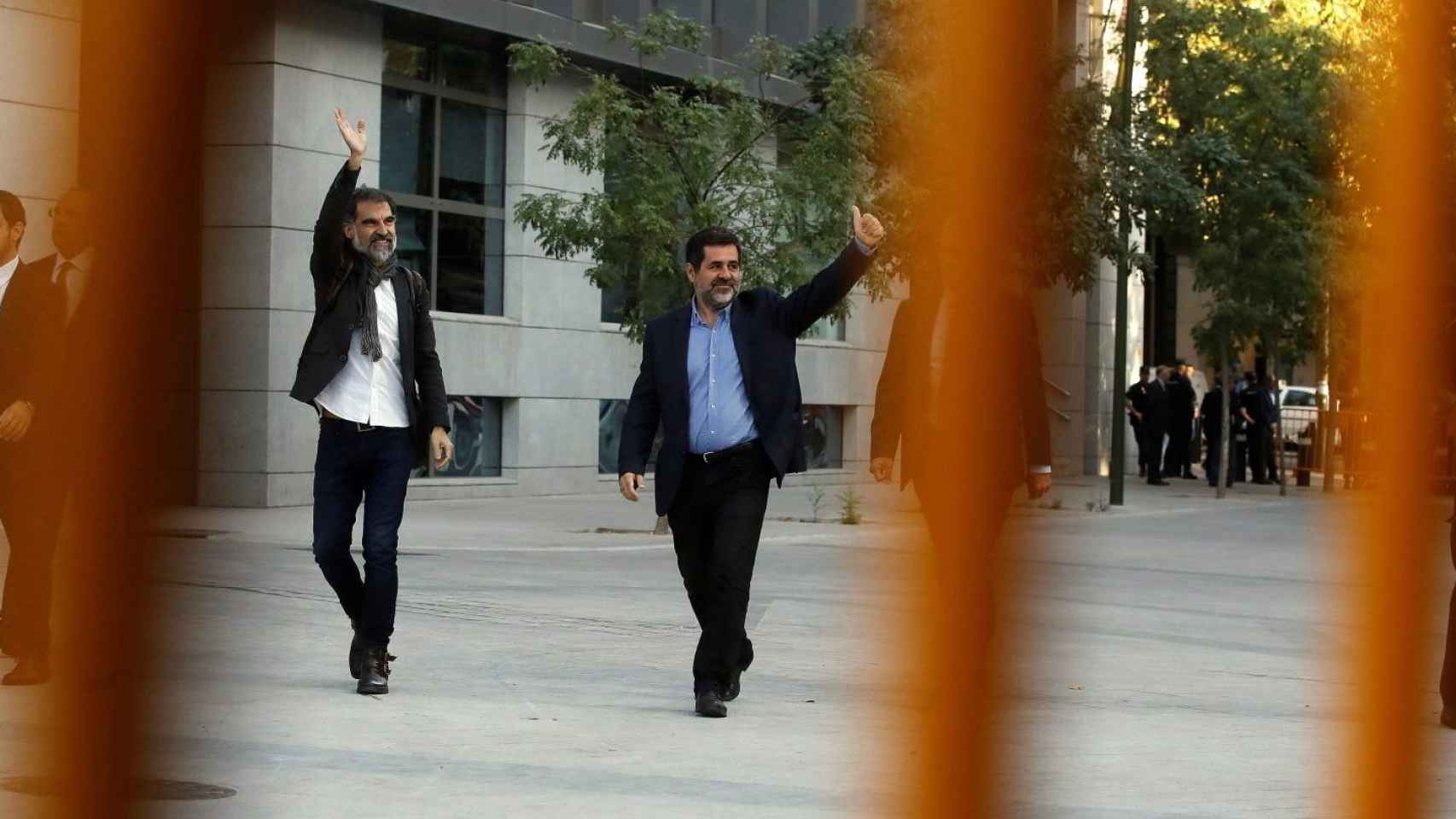 Jordi Cuixart (izquierda) y Jordi Sánchez entrando a la Audiencia Nacional.