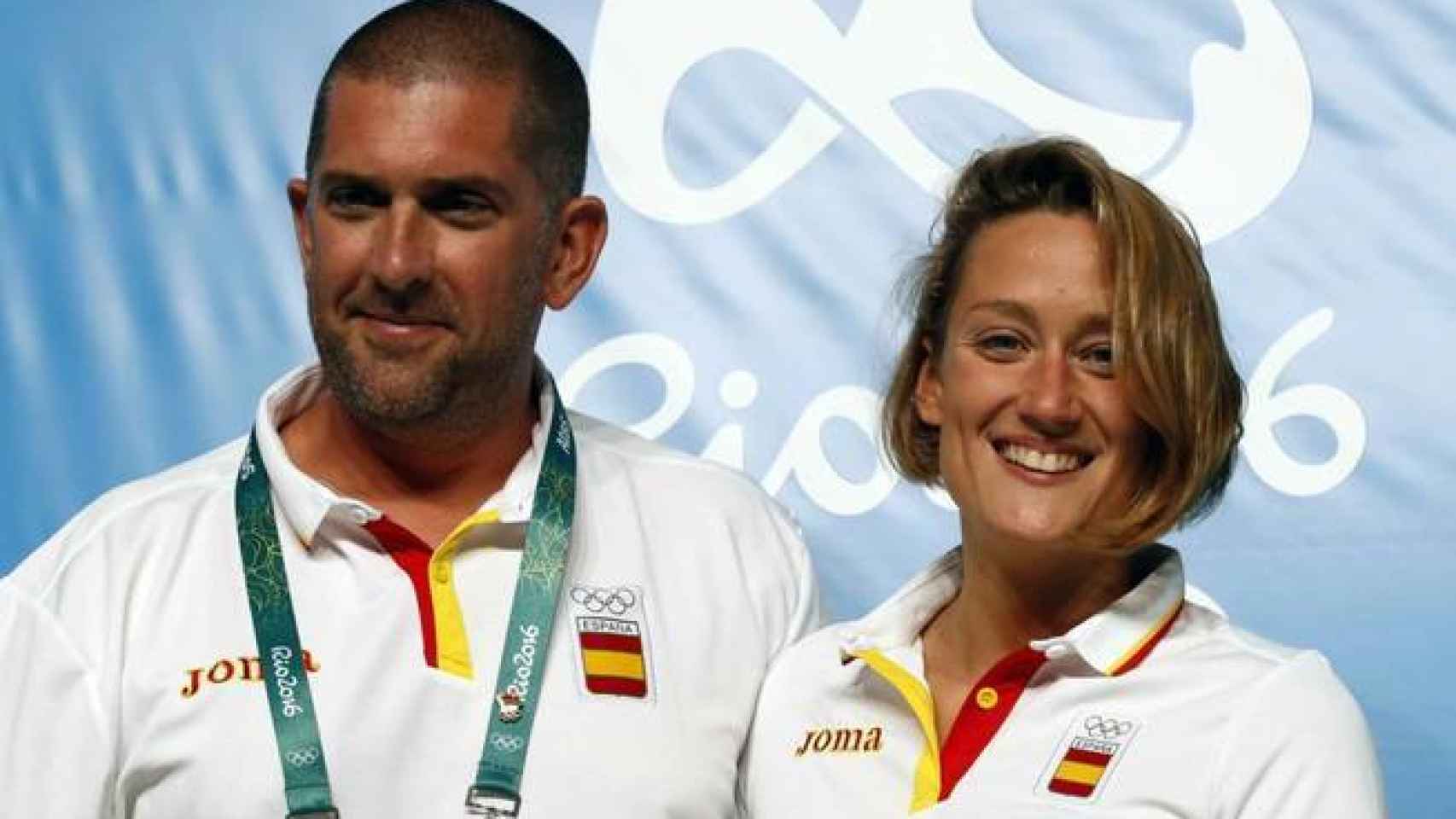 Mireia Belmonte, con Fred Vergnoux, su entrenador desde 2009.