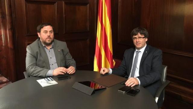 Puigdemont y Junqueras durante una reunión.