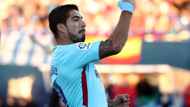 Luis Suárez celebra uno de sus goles al Leganés.