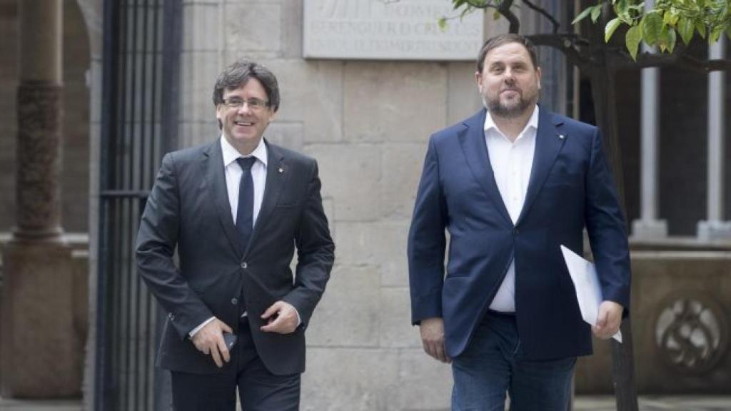 Carles Puigdemont y Oriol Junqueras, uno en Bruselas; y el otro en la cárcel.