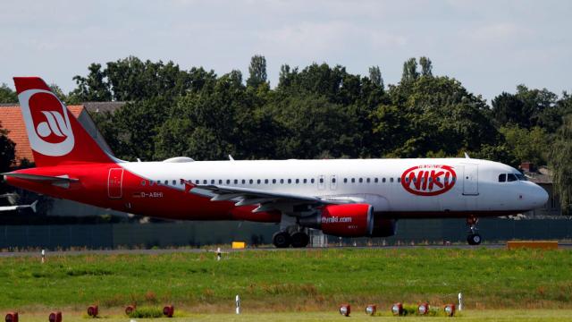 FILE PHOTO: An aircraft operated by German carrier Niki and Air Berlin sits on the tarmac of Berlin's Tegel