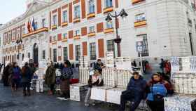 Puestos de venta de lotería instalados en la Puerta del Sol de Madrid.