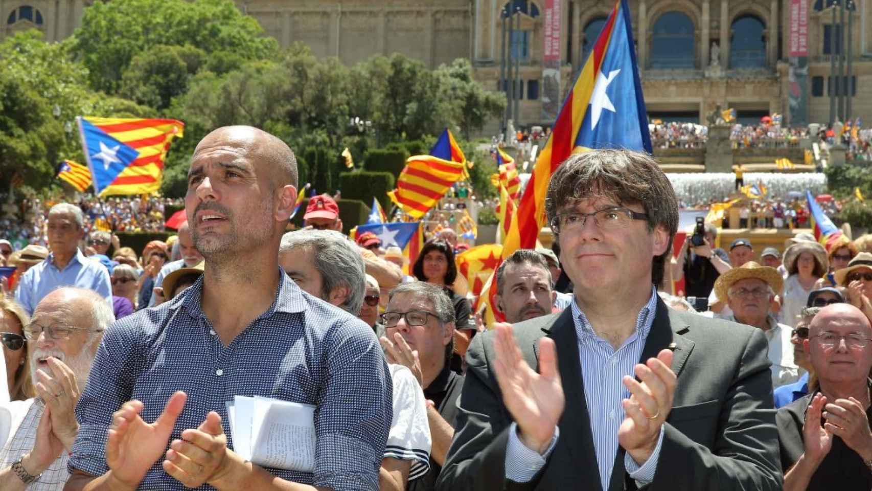 Pep Guardiola, junto a Carles Puigdemont.