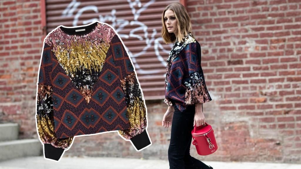 Olivia Palermo junto a la sudadera.