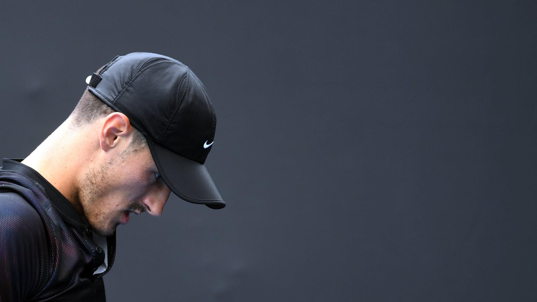 Tomic, durante su último partido de la previa en el Abierto de Australia.