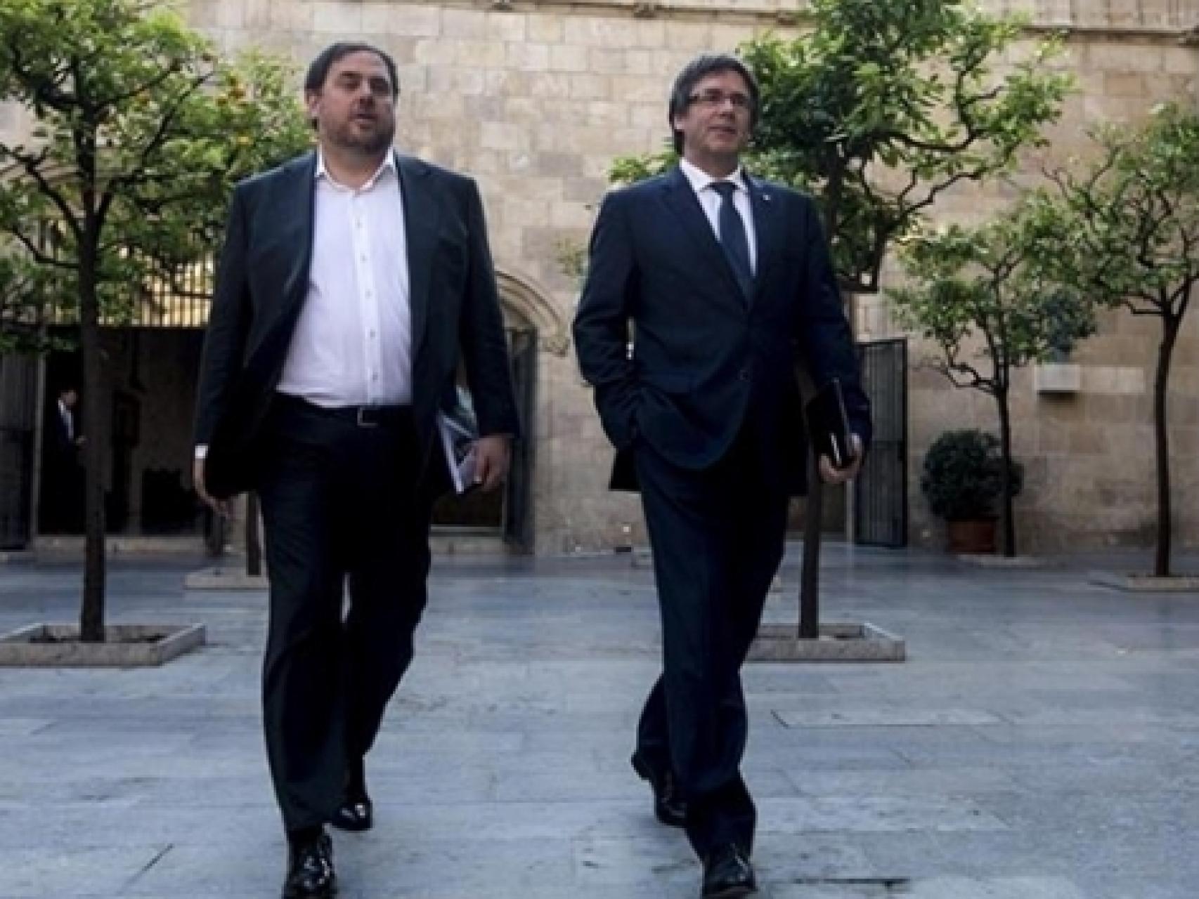 Oriol Junqueras y Carles Puigdemont acudiendo a un consejo de Gobierno.